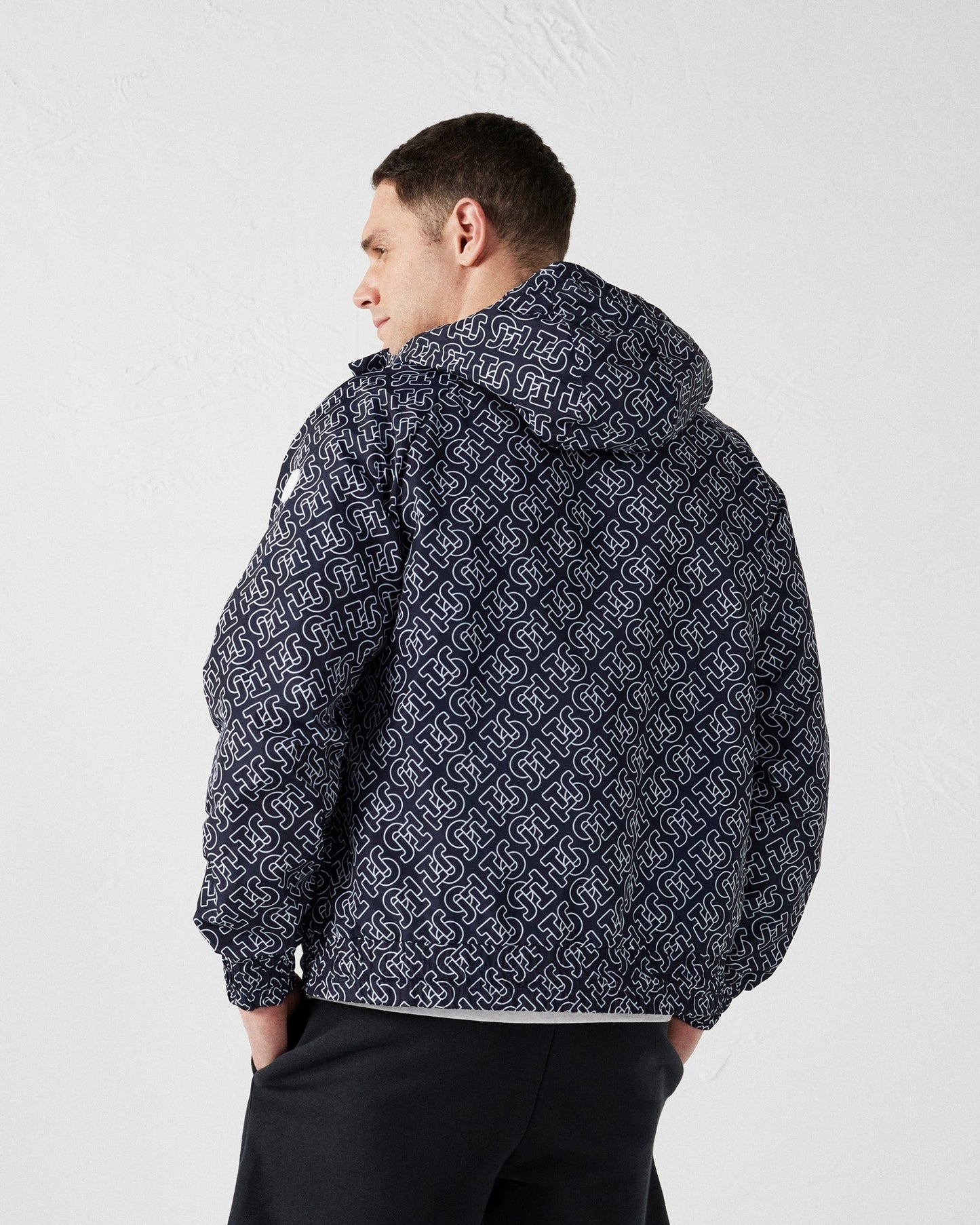 Blouson coupe-vent léger à capuche Mono marine Storm monogram