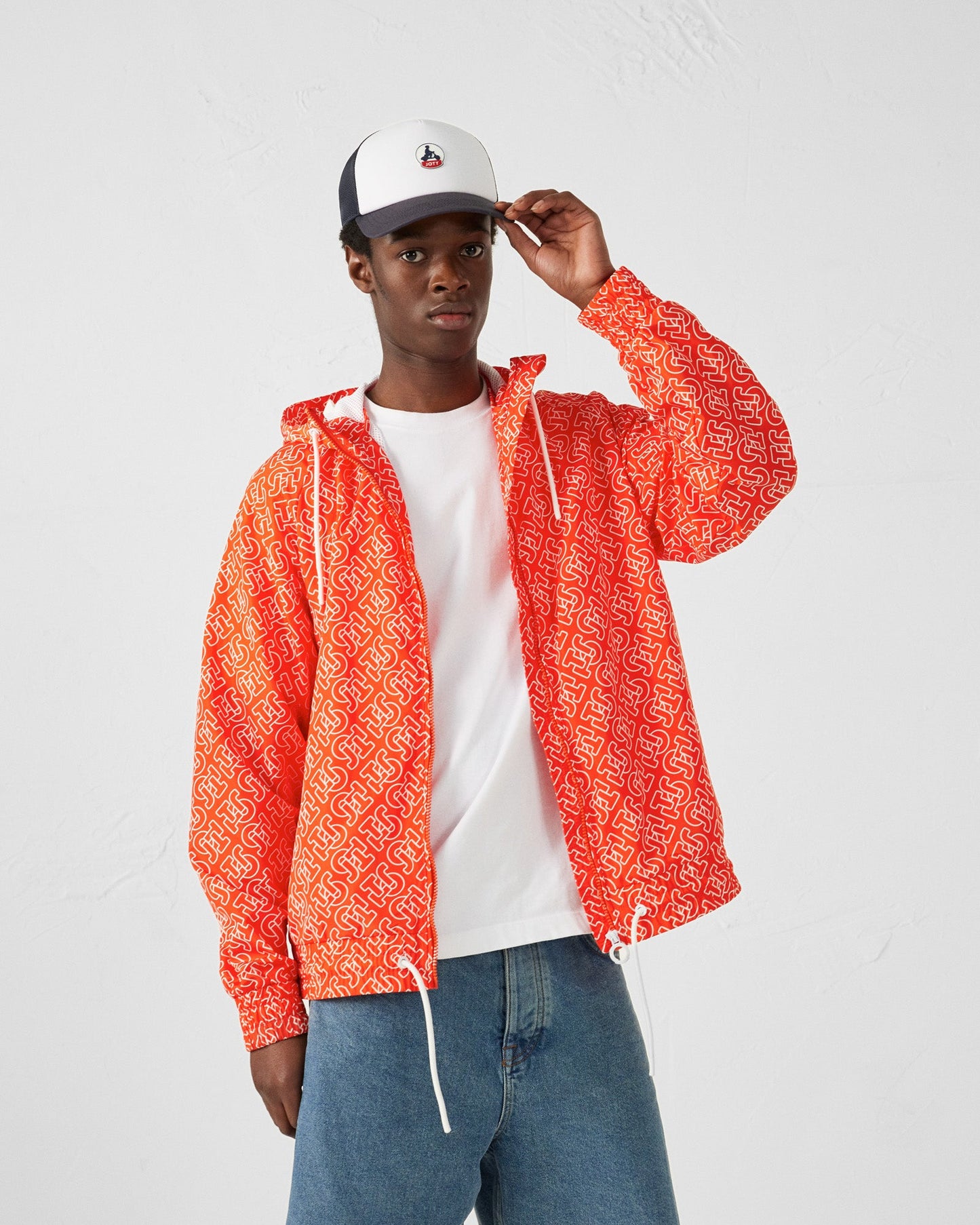 Blouson coupe-vent léger à capuche Mono rouge feu Storm monogram