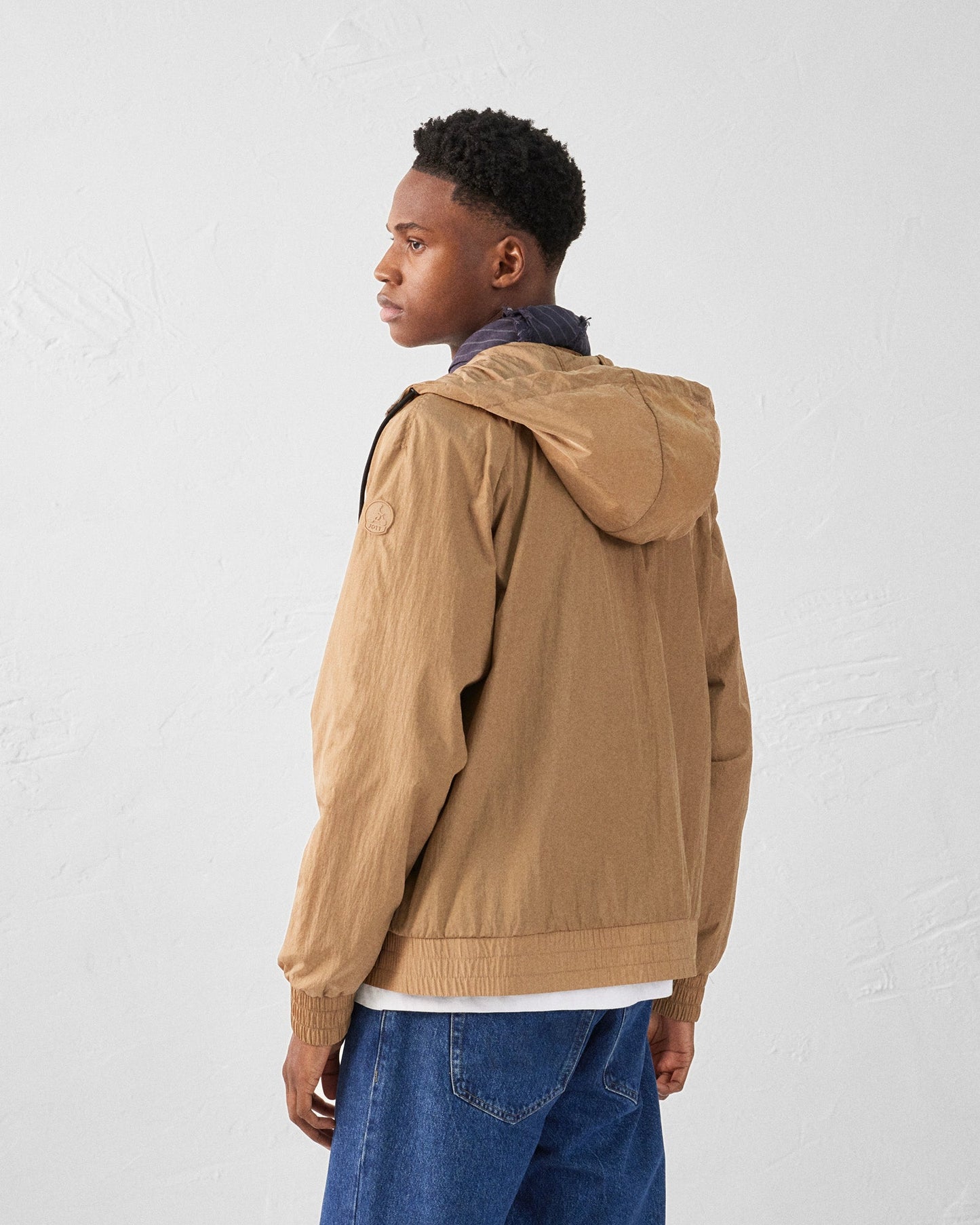 Blouson coupe-vent léger à capuche Fauve Storm