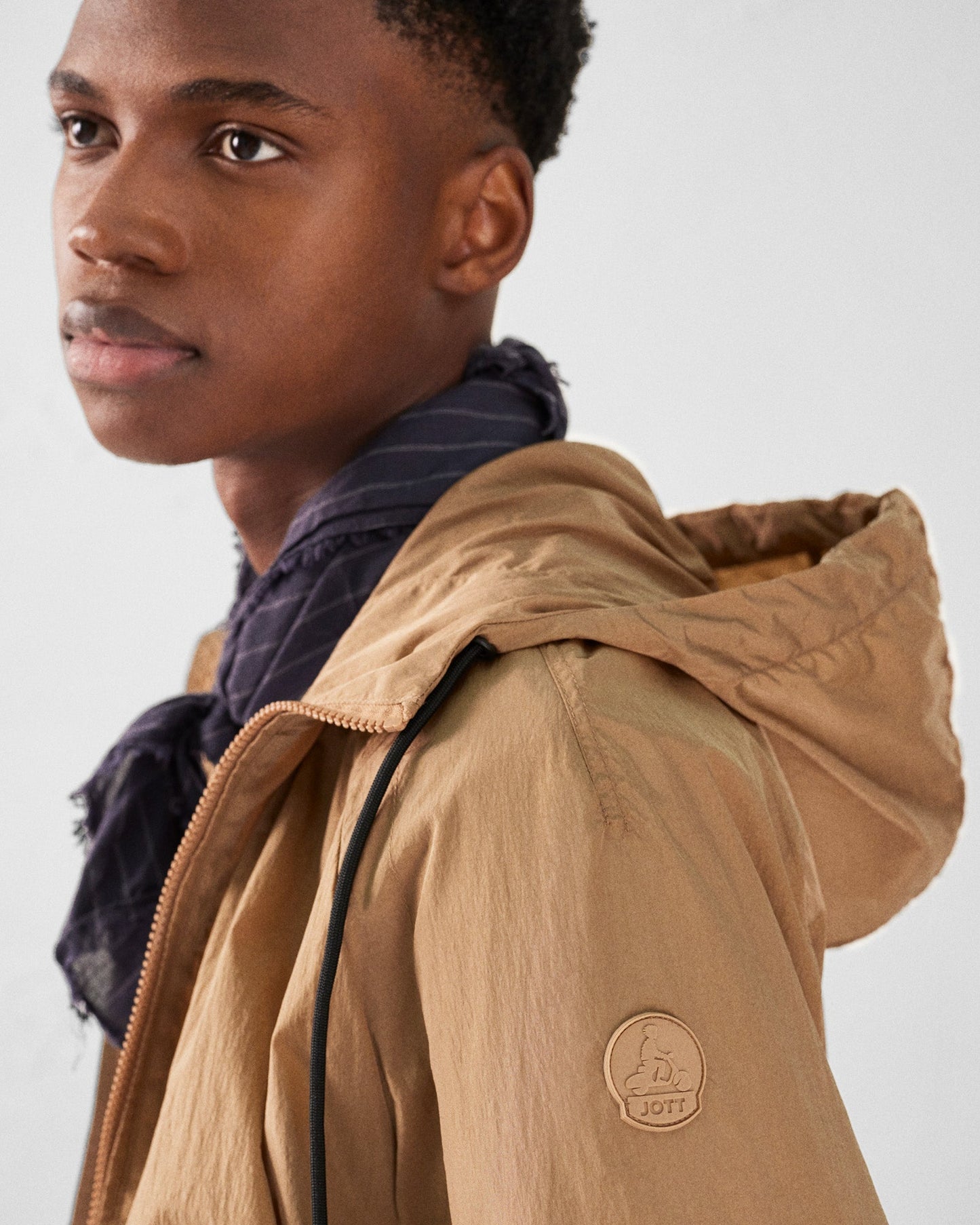 Blouson coupe-vent léger à capuche Fauve Storm